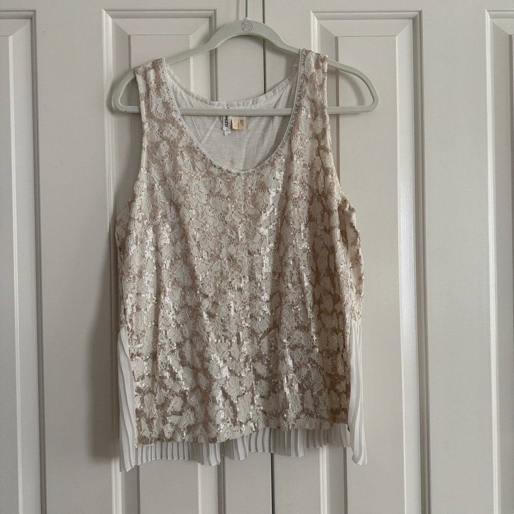 Sparkly and festive anthro top with pleated back 🌟🥂